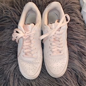 Light pink suede Nike shoes